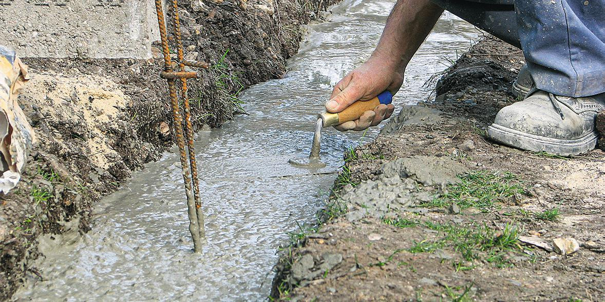 Couler une semelle filante pour un muret de clôture